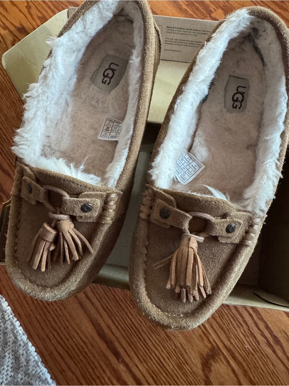 UGG Women’s Brown Suede Tassel Moccasin Slippers US 7